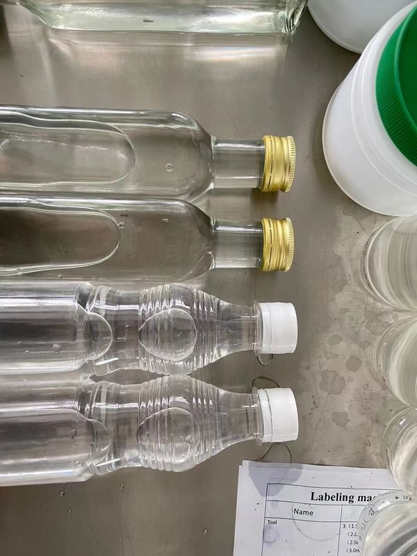 1000Bph-2000bph Mesin Pembungkus Botol Otomatis Jenis Linear yang Disesuaikan